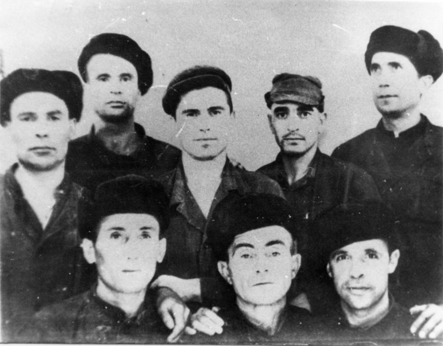 Members of Crimean Tatar national movement in labor camp in Navoi. 1969. Left to right, front row: Aider Bariev (1938-2010), Ismail Yazidhiev (1918/1920–1987), Izzet Hairov (1938–2021). Back row: Aktem Asanov (?), Nariman Kadyrov (1937–2016), Zeitulla Ibraimov (1939–2018), Reshat Bairamov (b.1943), Rollan Kadyev (1937–1990).